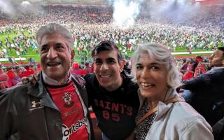 Rishi Sunak with parents Yashvir and Usha at St Mary's, celebrating Saints' 3-1 win over West Brom