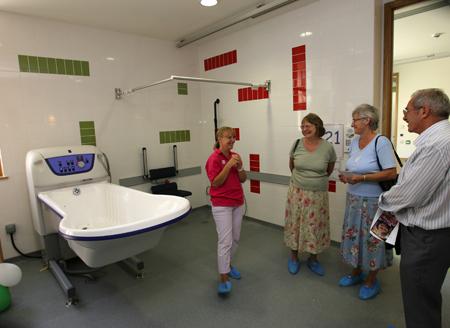 First look at Jack's Place at Naomi House Children's Hospice. Visitors look at the en-suite bathroom