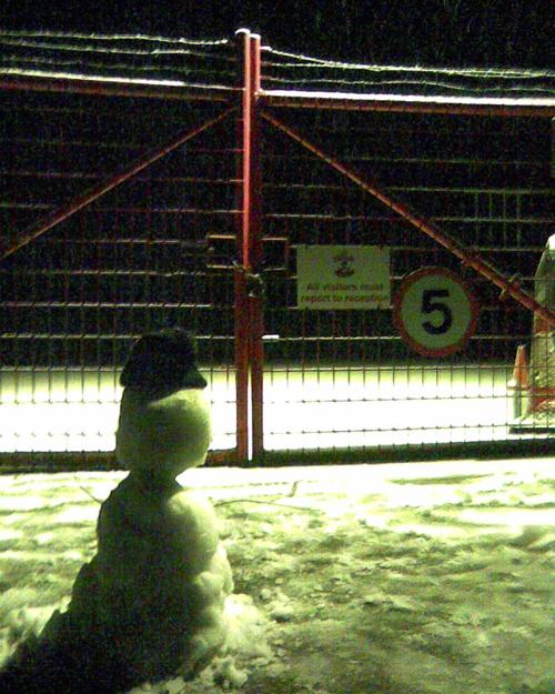  Snowman  outside the gates of the Saints training ground.