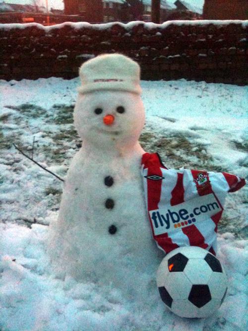 Here is the latest edition to the saints team, 'Snowgettingpastme'  
from 'Mygarden F.C' (my first snowman attempt turned out pretty well)  
let's hope he doesn't melt before the next game!! :) Kelly Mauger.
