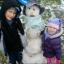 Brandon and Jasmine had fun building a snowman in the back garden.
