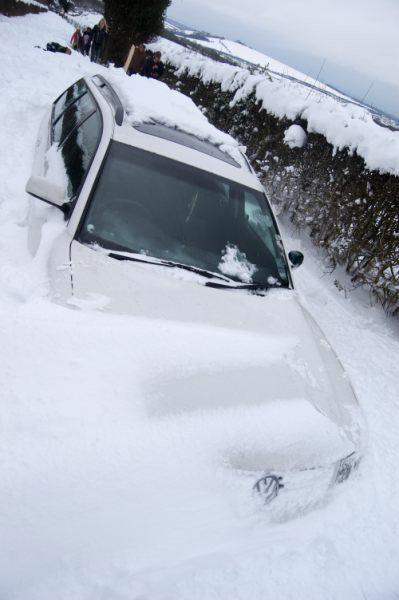 Unlucky motorist who got caught in a snow drift by Tristan Beard.