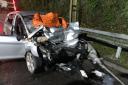 Driver arrested after car collides with parked lorry. Credit: Hants Roads Policing