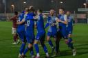 AFC Totton celebrate as they hunt league title success