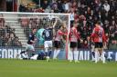Millwall score their first goal during the Championship match between Southampton and Millwall at St Mary's Stadium. Photo by Stuart Martin.