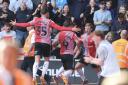 Flynn Downes and his Southampton teammates celebrate his late winner