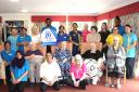 Residents and staff at Ashbourne Court Care Home celebrate the award