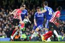 Shane Long in the thick of the action during Southampton's 1-1 draw at Chelsea