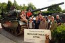 Members of the local Gurkha community and Ramsdell Church, in front of a Centurion MK12 tank at Milestones