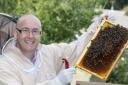 TASTE OF HONEY: Bee keeper Tony Mabey.
