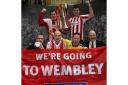 Saints fans who plan to walk to Wembley final get their hands on the Johnstone's Paint Trophy. Saints