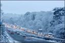 Traffic queues coming off the M27 this morning as snow covered Hampshire.