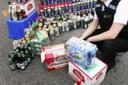 BOOZE HAUL: Acting Sgt Elizabeth Harfield with alcohol confiscated from under-age drinkers during a month-long crackdown.