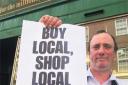 CHOP TO IT: Baynhams Butchers relief manager Gary Smith backs buying locally. Photo: Matt Watson Order no: 8290933