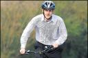 Daily Echo reporter Jon Reeve rides the electric bike