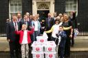 MPs and campaigners deliver the Have a Heart petition to 10 Downing Street