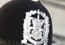 The helment of a member of Hampshire Constabulary
