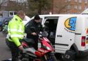 SAFETY DRIVE: A dynamometer proves the moped is derestricted by the speed reading, inset.