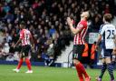 Dusan Tadic rues a missed opportunity at the Hawthorns