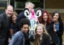 Daily Echo editor Ian Murray, left, and staff meet Gilbert the Zebra