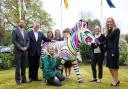 Staff from The Southampton Hoteliers Association and Destination Southampton with one of Marwell's Zany Zebras