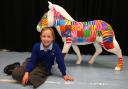Jamie Drinkwater, 9, and Zoe the Zany Zebra. Jamie won the school's competition for a design. Calmore Junior School