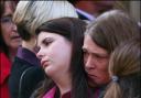Heartbroken  mother weeps at funeral of her murdered daughters
