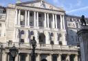 Bank of England slashes rate to record low of  half a per cent