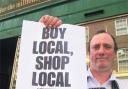 CHOP TO IT: Baynhams Butchers relief manager Gary Smith backs buying locally. Photo: Matt Watson Order no: 8290933