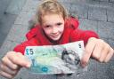 Chloe Bradley flashes her cash