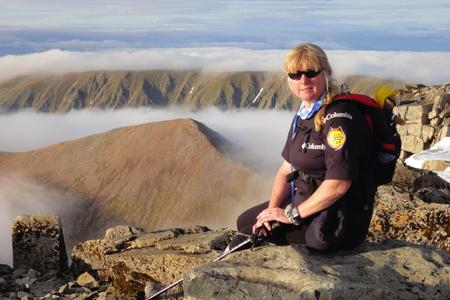 ON TOP OF THE WORLD: Patricia Daas pictured on Ben Nevis. Patricia successfully completed the Three Peaks Challenge to raise funds for Help For Heroes. 