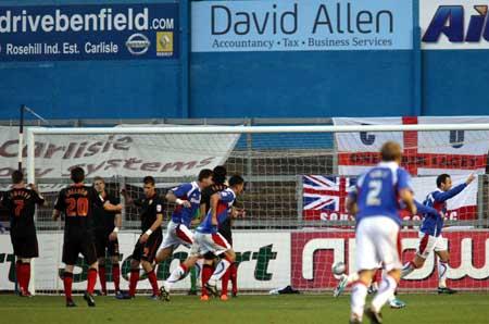 Carlisle celebrate their third goal as Saints despair