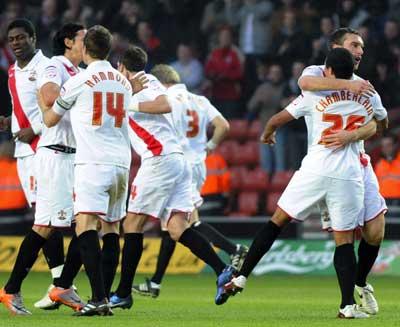 Saints celebrate Rickie Lambert's equalising goal. A selection of images from the Southampton versus Huddersfield Town League One match on December 28, 2010 at St. Mary's Stadium