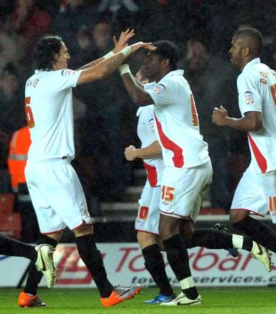 Jaidi celebrates his goal with Fonte. A selection of images from the Southampton versus Huddersfield Town League One match on December 28, 2010 at St. Mary's Stadium