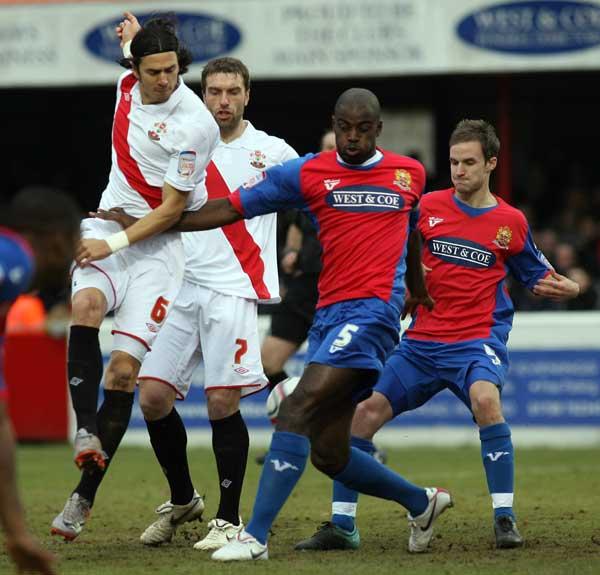 Jose Fonte's shot is blocked. A selection of images from the Dagenham & Redbridge v Southampton League One match on January 3 2011