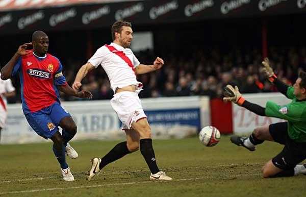 Rickie Lambert misses a first half chance. A selection of images from the Dagenham & Redbridge v Southampton League One match on January 3 2011