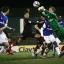 Oldham keeper Ben Amos punches the ball away under pressure. A selection of images from Saints' 6-0 romp against Oldham at Boundary Park.