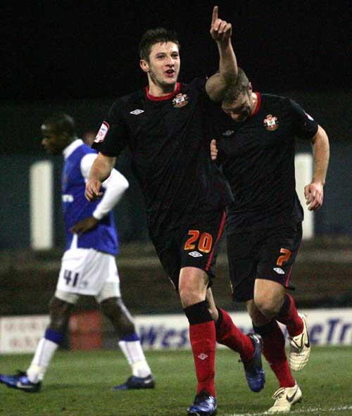 Adam Lallana celebrates his goal. A selection of images from Saints' 6-0 romp against Oldham at Boundary Park.