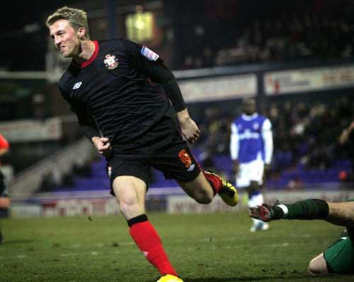 Lee Barnard scores Saints sixth goal. A selection of images from Saints' 6-0 romp against Oldham at Boundary Park.