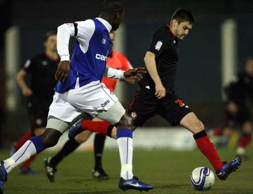 Adam Lallana poised to shoot. A selection of images from Saints' 6-0 romp against Oldham at Boundary Park.