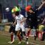 Ryan Dickson wins header.