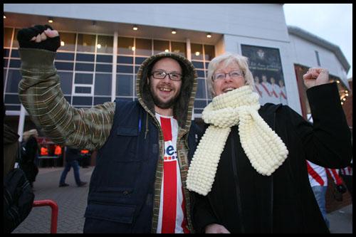 Lewis Felgate with his mother Jools get prepared to take their seats at the FA Cup tie between Saints and Man United at St. Mary's.