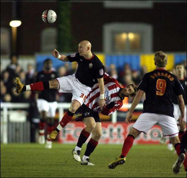 Richard Chaplow wins a high ball. A selection of images from Exeter v Saints game at St James's Park.