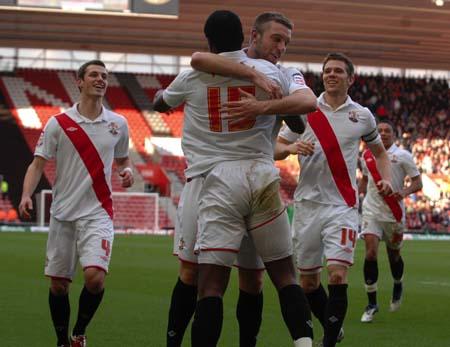 Saints celebrate Jaidi's goal. Photos from the League One match between Southampton and Swindon at St. Mary's on Saturday,. February 26, 2011.