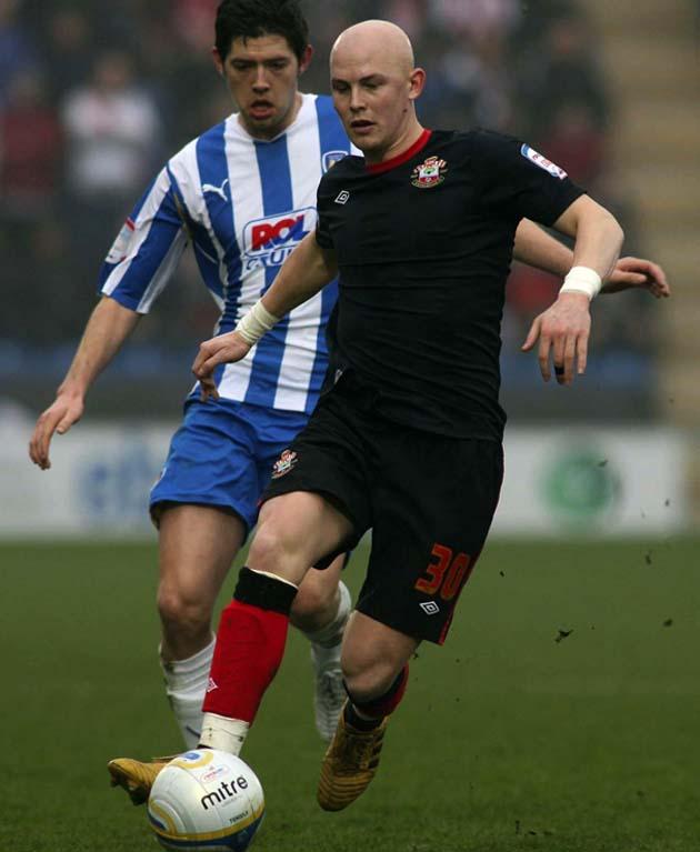 Richard Chaplow plays the ball against Colchester.