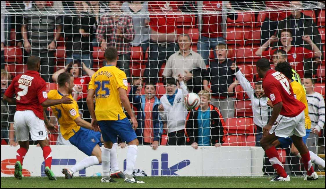 Photographs from Oakwell as Saints take on Barnsley in the Championship on August 13, 2011. Fraser Richardson clears the ball off the line in injury time.