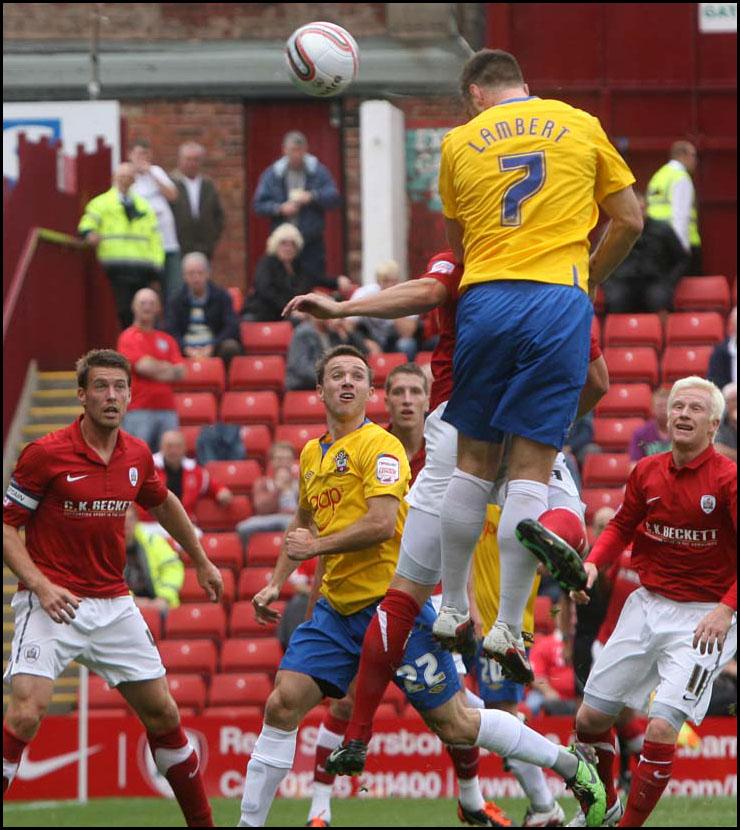 Photographs from Oakwell as Saints take on Barnsley in the Championship on August 13, 2011. Rickie lambert heads just wide.