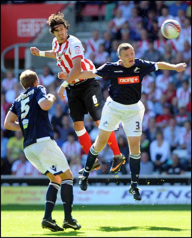 Jose Fonte rises to win a header. Photos from Saints Championship match against Millwall on Saturday, August 20, 2011
