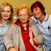 CARING HEROES: Magdalena Wisniewska with resident Joyce Collins and Louise Howe-Piper. Joyce has nominated the carers for the Echo awards. 	Echo picture by Joanna Mann. Order no: 9755221