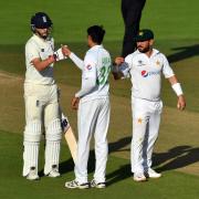England's Joe Root and Pakistan's Mohammad Abbas fist bump after the match ends in a draw during day five of the Second Test match at the Ageas Bowl, Southampton.